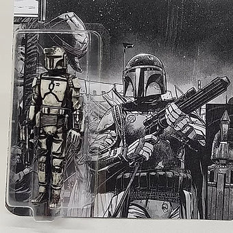 Black rub Fett on comic card back